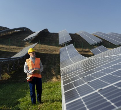 person-near-alternative-energy-plant